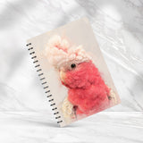 Galah Cockatoo Captures Spiral Notebook